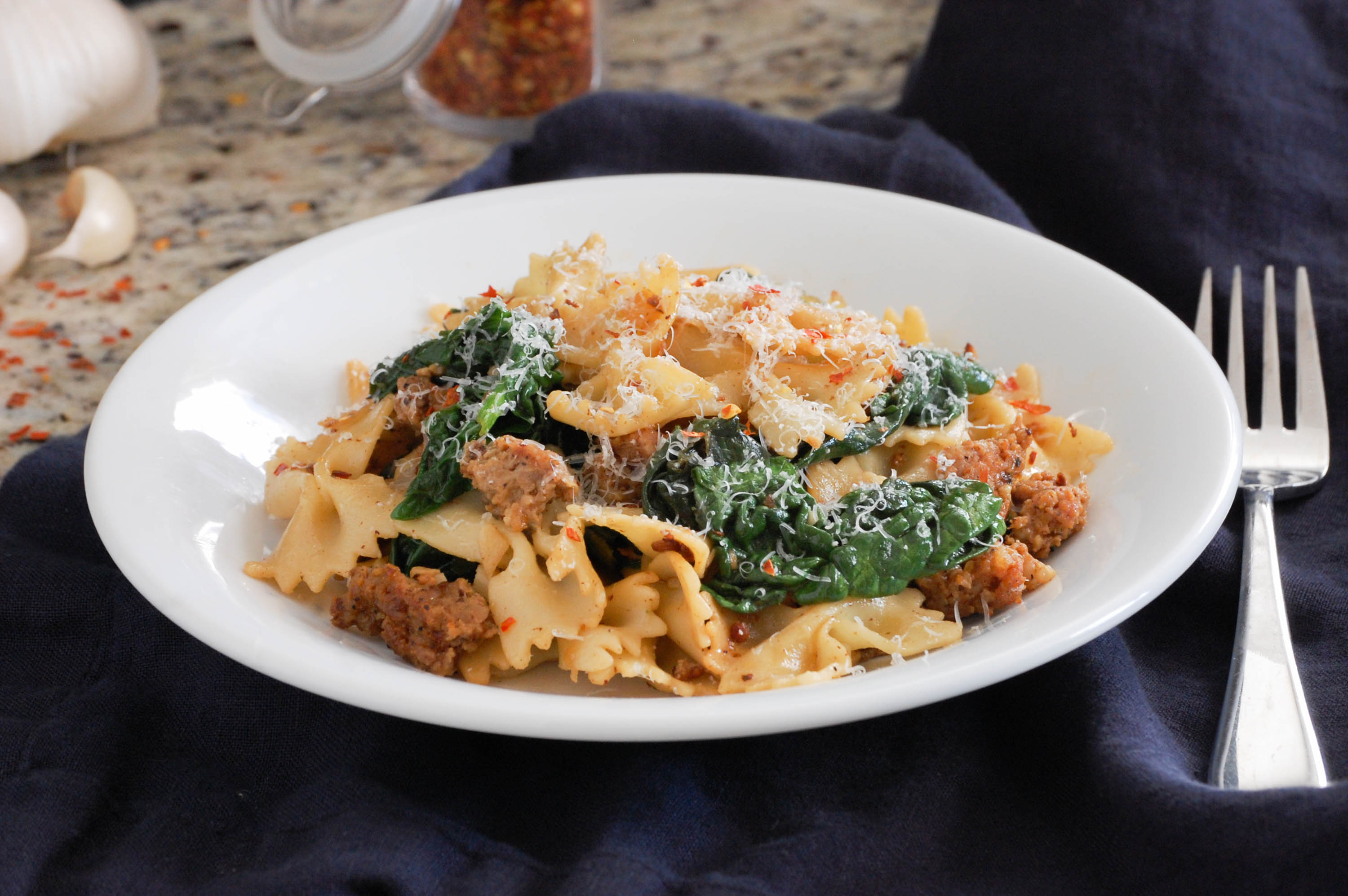 Spicy Pasta with Sausage and Spinach via The District Table